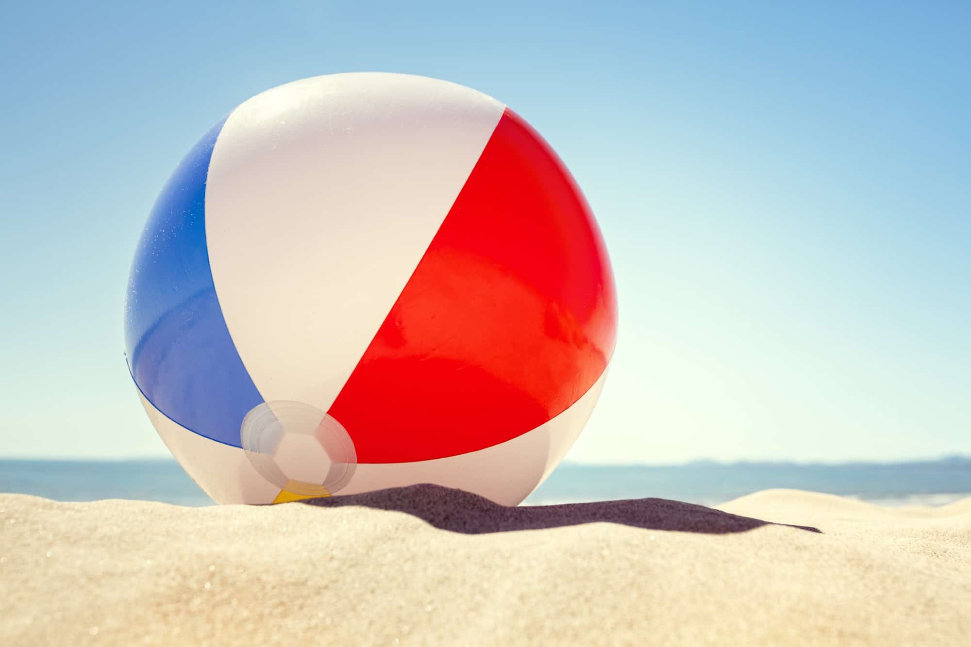 Beach ball on the sand